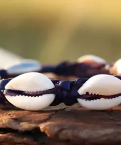 Lederarmband aus Muschel Ideal für Damen und Herren , ideal für Strand und Meer .