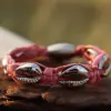 Muschelarmband Rosa aus geflochtene Leder - für Damen und Herren . 100 wasserfest