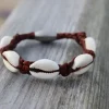 Damenarmband Kauri Muschel Herrenarmband - für Damen und Herren Strand Sommer Muschel Armband aus Leder