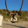 Halskette Koru Spirale Lederkette - Maori Anhänger für Damen aus Neuseeland.