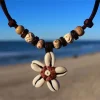 Muschelkette Hawaii Blumenkette Lederkette - Ideal für Sommer Damen Surfer Kette aus Kauri Muschel